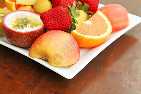 新鲜水果木头早餐甘露橙子食品盘子浆果饮食橘子甜瓜图片
