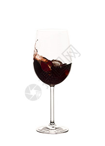 红酒洒在玻璃杯中图片