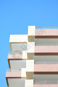 公寓楼的详情单位 一幢公寓楼花园天空旅游太阳棕榈蓝色热带旅行风景房子图片