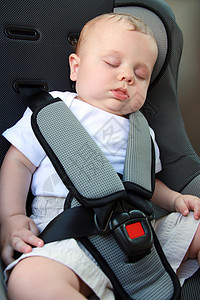 婴儿睡在汽车座椅上睡眠安全孩子们孩子腰带旅行儿童运输男生保护图片