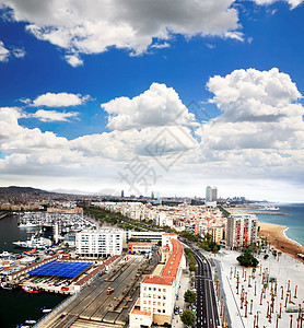 巴塞罗那市和港湾的空中观察旅行天线椭圆形城市商业景观观光游客办公室吸引力图片
