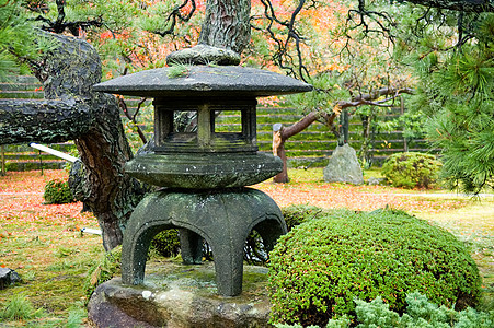 花岗灯岩石石头寺庙花园盆栽旅游灯笼文化宗教叶子图片