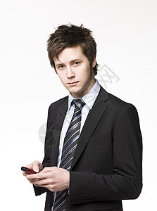 拥有手机的商务人士衬衫短信呼唤男人移动电话商业业务员电话通讯领带背景图片