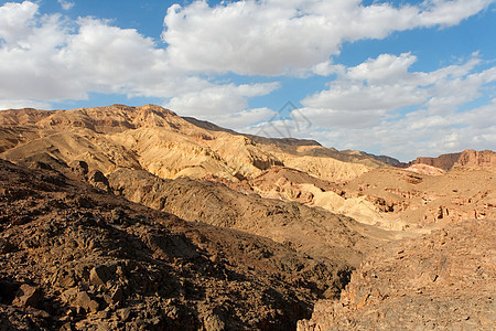 石头沙漠景观棕色丘陵公园黄色巨石风景内盖夫环境橙子砂岩图片