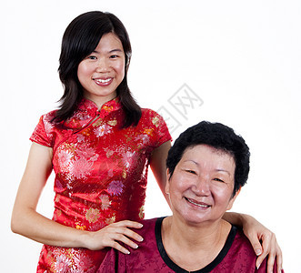 母亲和女儿庆典家庭成人女孩女士文化老年衣服旗袍父母图片