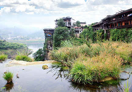 a 中国少数民族村景色农村天空风景房子溪流吸引力少数民族住宅电影乡村图片