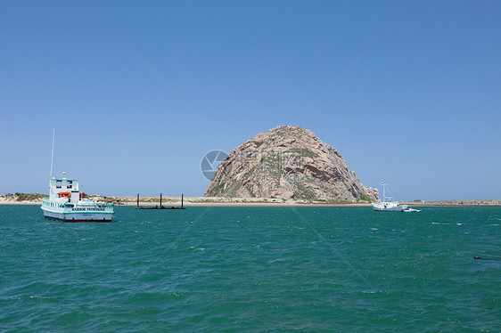 莫尔罗湾钓鱼航行海岸线岩石海洋悬崖风景港口天空旅行图片