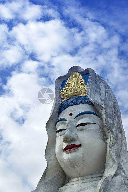 Guanyin 雕像宗教女性历史文化警卫菩萨男性雕塑传统天空图片