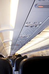 飞机机舱航空公司航班班级商业旅游乘客天花板游客座位控制板图片