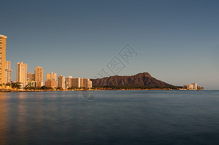 日落时的怀基基海滩闪光旅行异国热带海岸线情调建筑假期景观城市图片