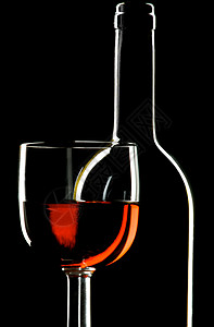 红酒瓶子反思红色玻璃反射酒厂酿酒师剪影品酒图片