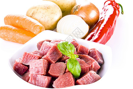 盘牛肉和蔬菜臀部饮食美食红色胡椒洋葱经济倾斜牛扒营养图片
