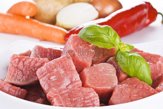 盘牛肉和蔬菜胡椒营养食物洋葱烹饪食品倾斜经济臀部马铃薯图片