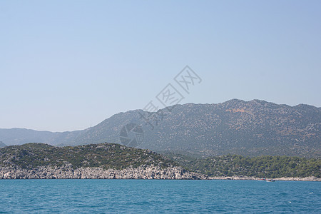 地中海海岸石质快乐岩石帆船波浪游艇航行绿色旅行背景图片