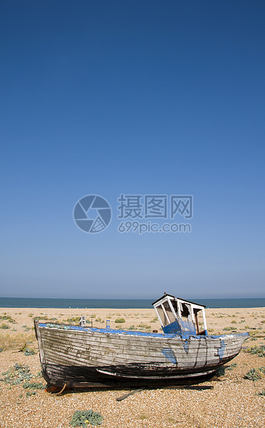 旧船钓鱼海滩血管天空破坏卵石海岸蓝色鹅卵石航海图片