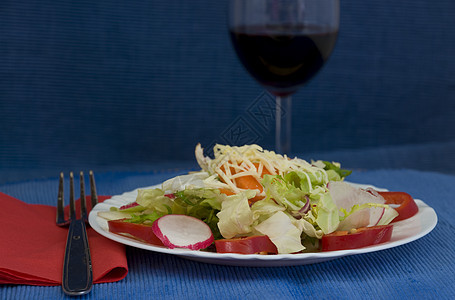 健康生活方式蔬菜萝卜叶子盘子橙子餐厅蓝色环境桌子餐巾图片