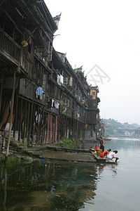 中国 湖南 湖南西部 凤凰城 自然 风景 旅游 风景区 风景区水利街道旅行设施用水游船房子城门河流建筑图片