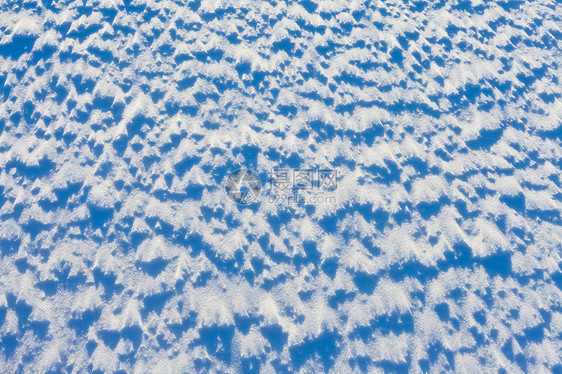 雪地背景纹理模式雪景季节太阳水晶粉状阴影清扫阳光结晶白色图片