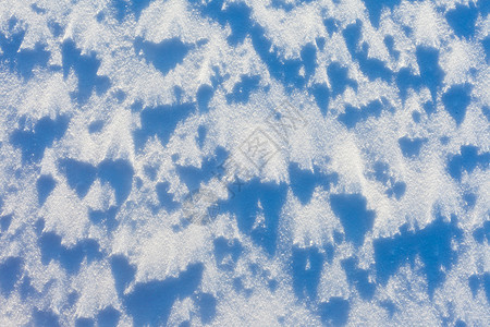 雪地背景纹理模式清扫白色太阳水晶粉状荒野结晶粉末阴影雪景图片