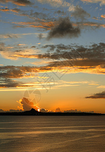 日落天空海岸假期蓝色晴天石头墙纸地平线旅行太阳图片