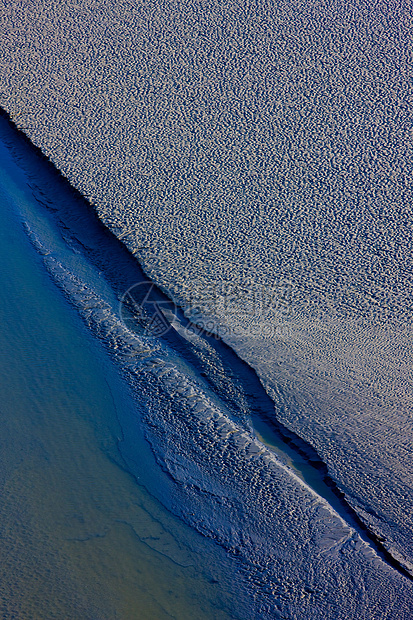 法国诺曼底州蒙特圣米歇尔低潮自然海岸外观表面部门背景图片