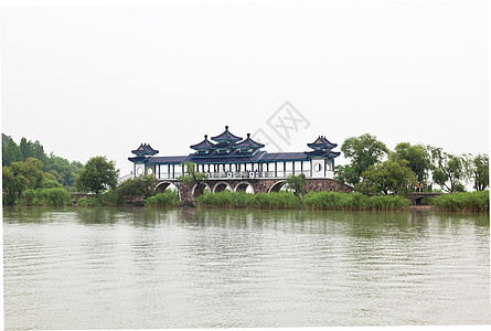 中国武西市日湖公园插图建筑宗教艺术建筑学植物绿色公园寺庙房子图片