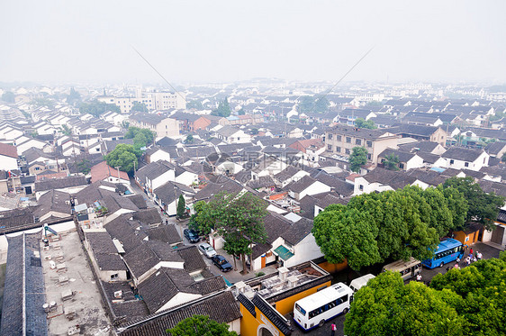 中国苏州市空中航向房子寺庙宝塔吸引力烟雾植物花园建筑物住宅天线图片