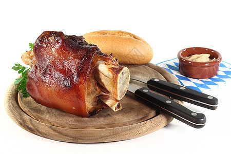 烧烤猪叉果皮蓝色皮肤白色食物猪肉盘子餐巾小腿骨头图片
