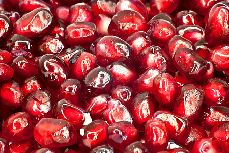 红色多汁 成熟的石榴树frui果汁美食花岗岩植物种子红宝石食物石榴粮食宏观图片