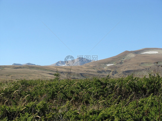 腊果纳基高原植物群天空高山旅行植被剪影山脉文件冰川一条路线图片