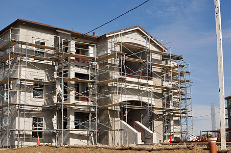 正在建造的公寓楼综合建筑脚手架天空建筑学城市办公室项目住宅材料金属承包商图片