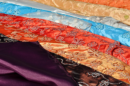 印度制造业刺绣市场叶子精神纺织品文化线条橙子紫色店铺图片