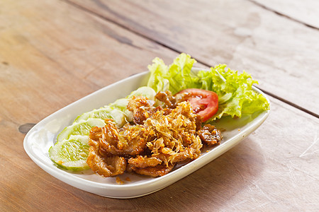 泰国菜 猪肉和大蒜在盘子上熟食烹饪炙烤美食沙拉午餐美味油炸牛肉牛扒图片