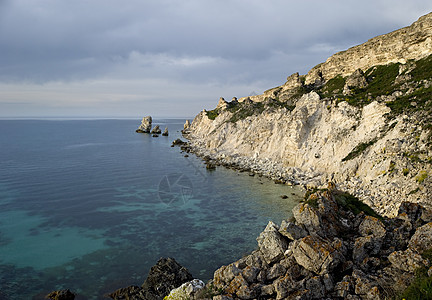 扬古尔孤独场景日落云景阳光海浪假期风景戏剧性岩石图片