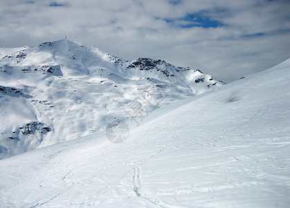 冬季山全景蓝色荒野太阳地形岩石天际城市风景天空图片