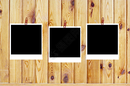 一组由木质表面的三块旧空白极地框组成边界卡片记忆羊皮纸插图照片标签相片集明信片艺术图片
