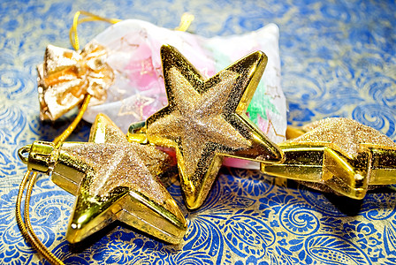 圣诞节装饰品玩具节日展示新年礼物金子背景图片