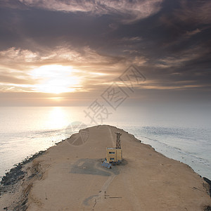 太阳在海洋上升起力量地平线天空低潮太阳阳光海滩波纹天堂图片