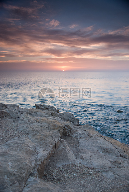 太阳在海洋上升起地平线天堂波纹低潮力量海滩太阳阳光天空图片