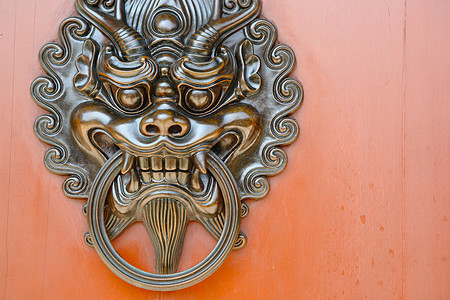 狮子门把手装饰品狮子风格智慧寺庙艺术金属圆圈黄铜建筑图片