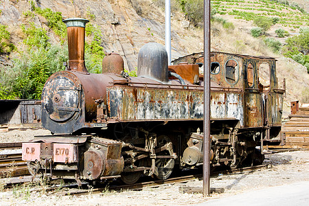 葡萄牙杜罗谷图阿的老车机器外观残骸引擎铁路仓库机车交通工具蒸汽运输背景图片