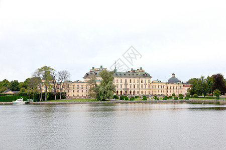 斯德哥尔摩市的宫治理家庭建筑雕像皇家天空城堡旗帜蓝色国王图片