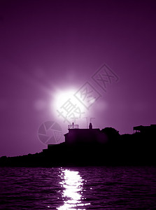 灯塔风暴旅行航海房子安全紫色蓝色多云准则海洋图片