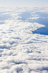 从平面看云层天空背景外观鸟瞰图白色航班蓝色图片