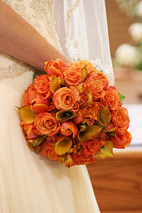 甜甜时间服饰新娘花束婚礼橙子仪式庆典象牙背景图片