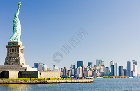 自由女神像和美国纽约市曼哈顿自由建筑学地标雕塑旅行建筑物摩天大楼雕像天际建筑图片