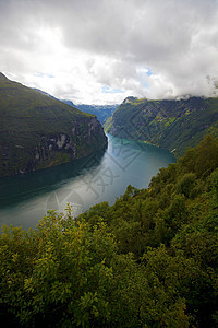 Geiranger 视图血管国家天空旅行地区蓝色巡航石头爬坡峡湾图片