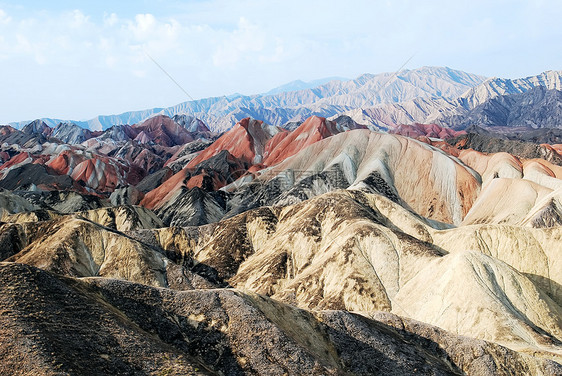 风蚀土形地貌地质岩石地质学旅行红色爬坡图片