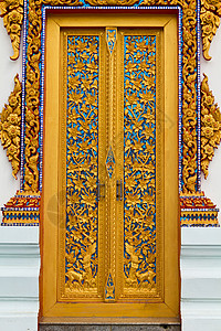 门上的泰国传统风格入口旅游绘画宗教旅行雕塑手工信仰工艺寺庙图片