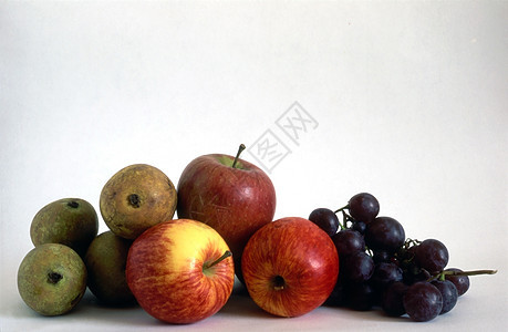涂漆背景的多种水果食物活力营养饮食雕像维生素健康沙拉柚子早餐图片